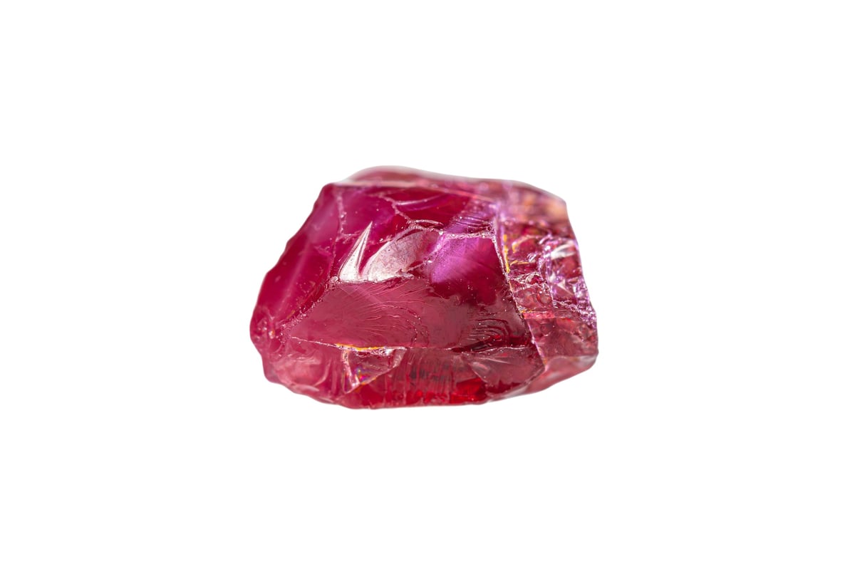 A rare natural rough cat's eye rhodolite garnet gemstone